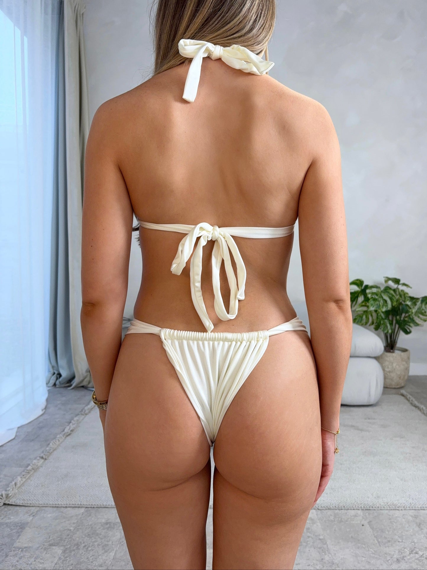 Ivory double tie flutter top